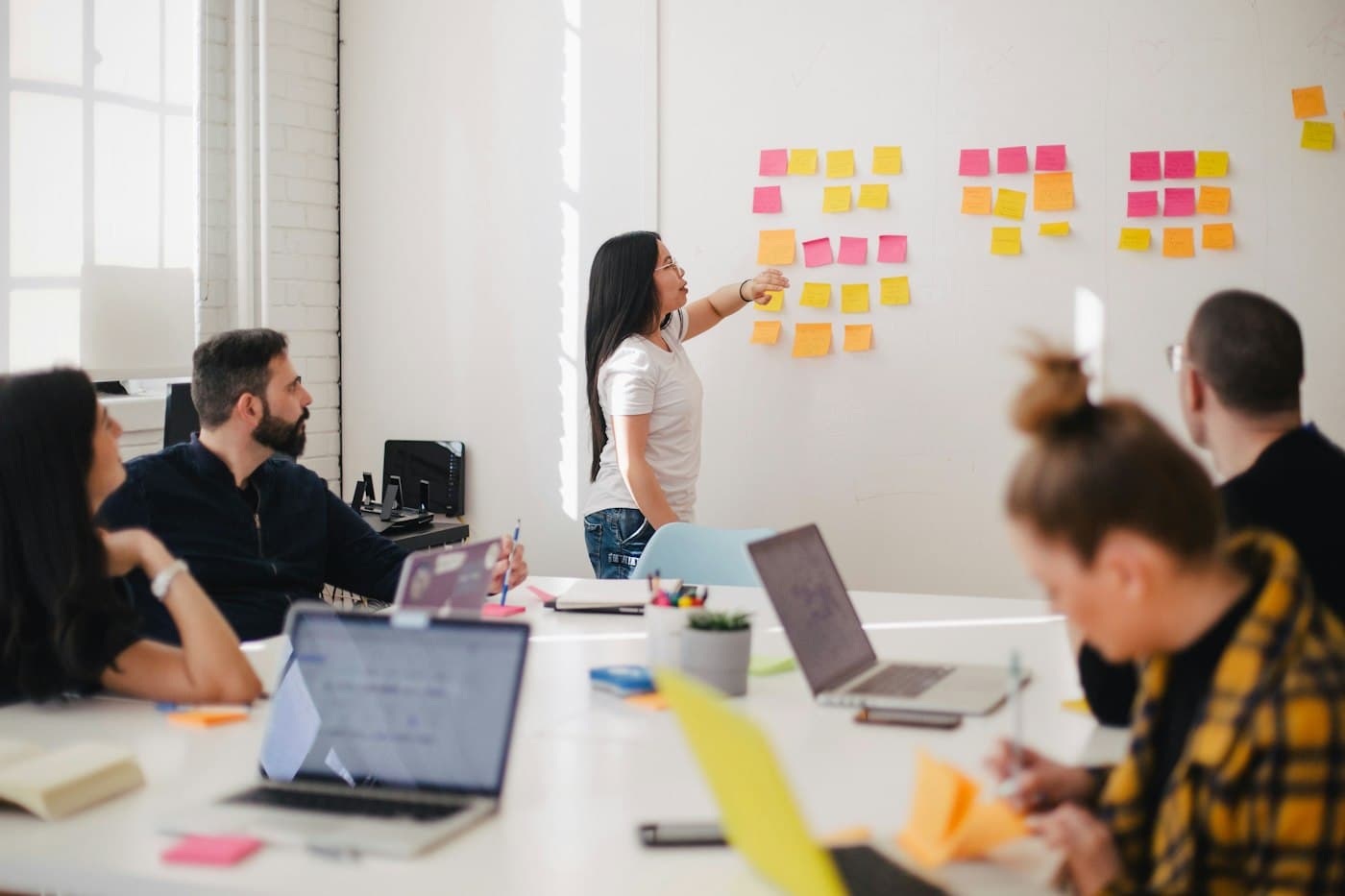 Our team collaborating around a meeting table